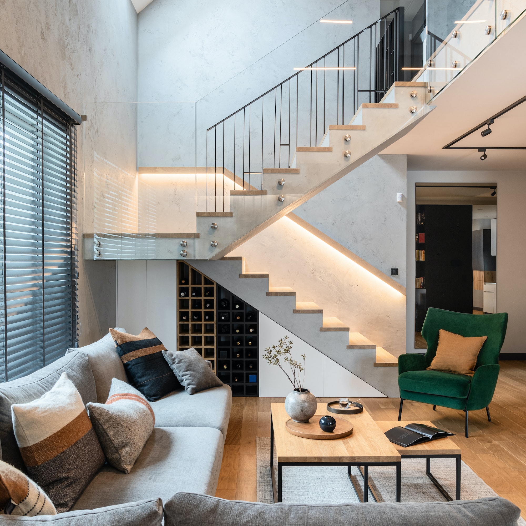 stylish composition of stairs in living room interior