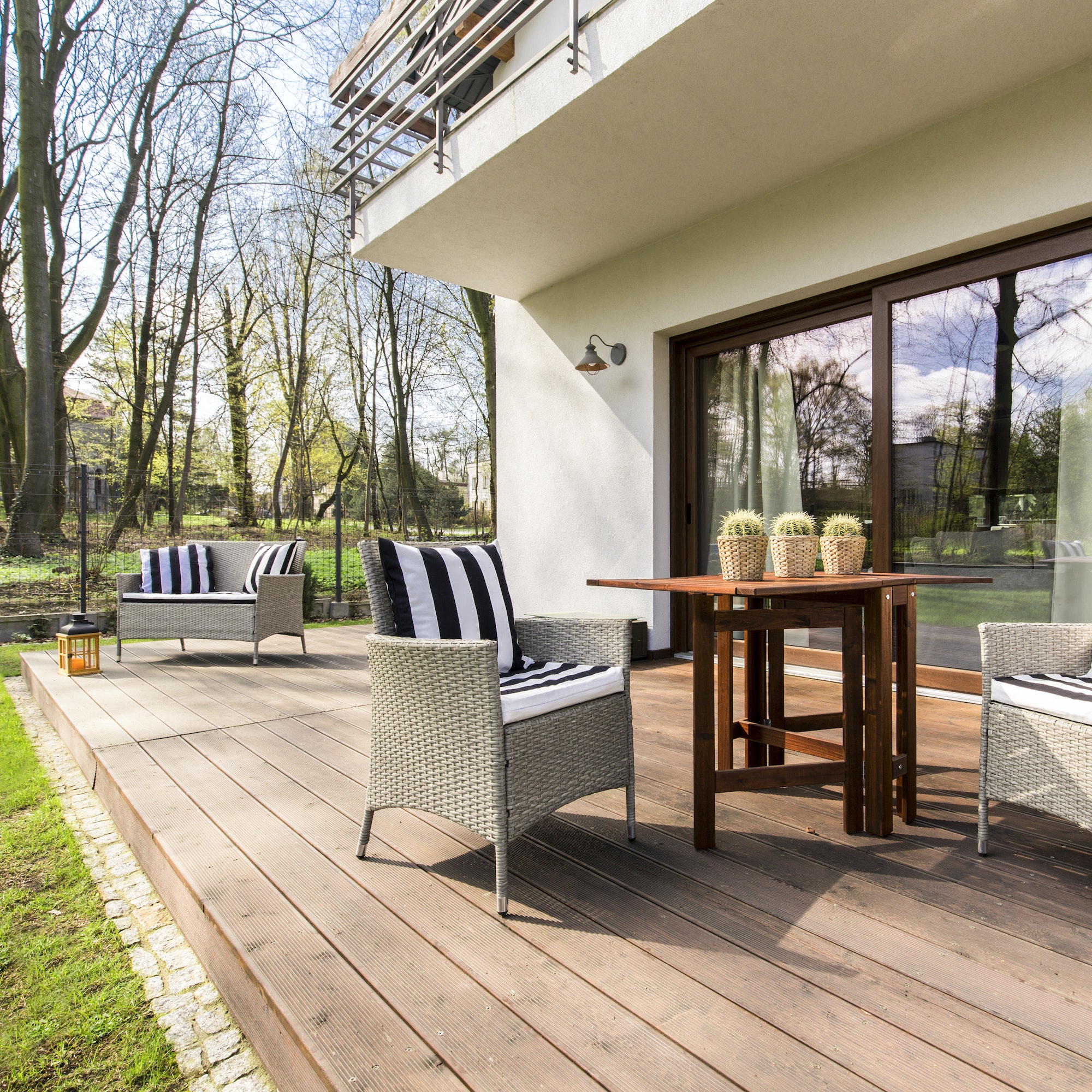 wooden porch with chairs